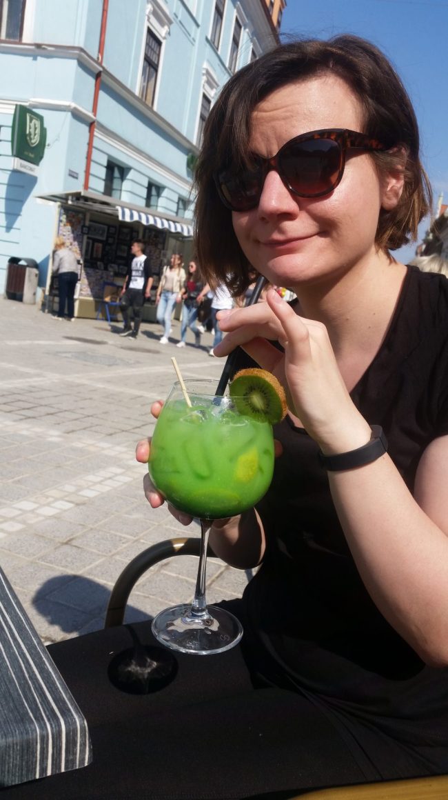 Drinking kiwi lemonade