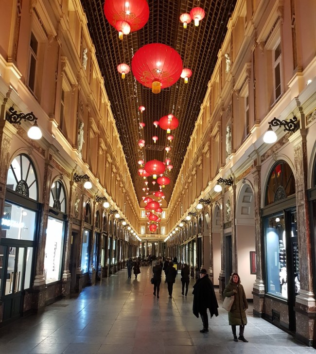 Nighttime at the Galeries, home to many chocolate shops