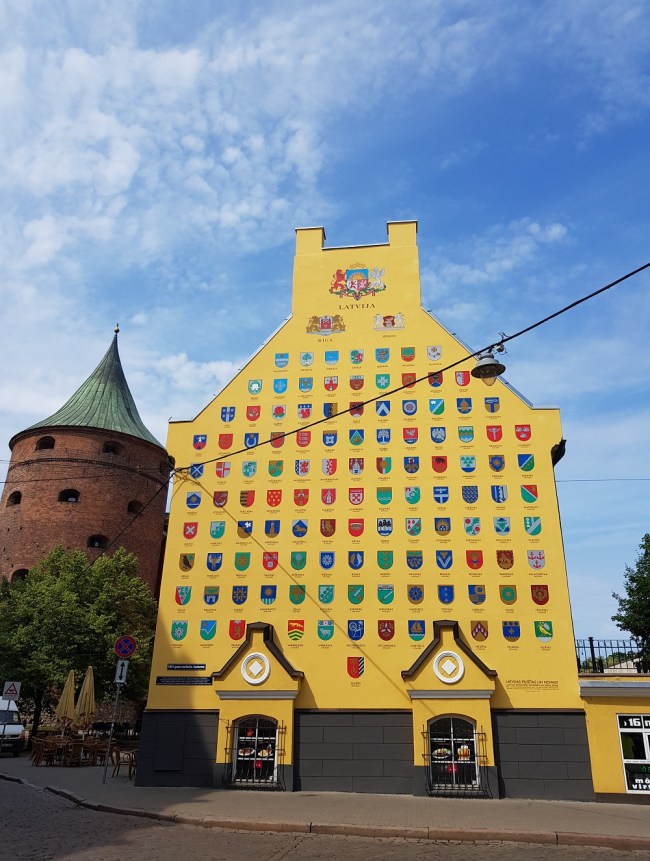 Latvian crests on a wall