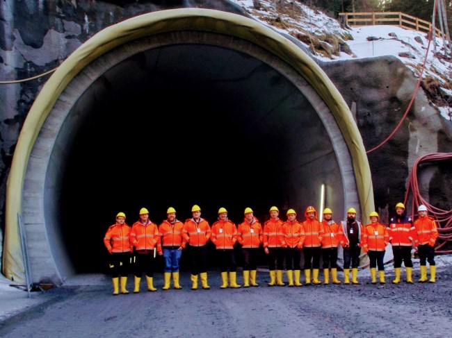 The group in front of the tunnel